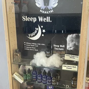 Halo Infusions brand Tincture and Topical display