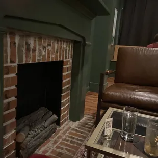 a living room with a fireplace