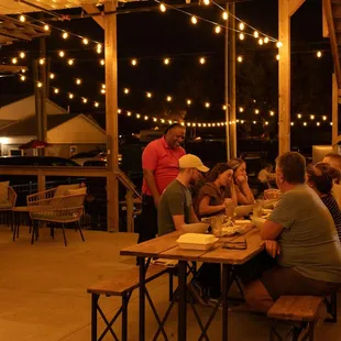 a group of people sitting at a table