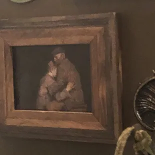 Picture of father embracing the prodigal son.