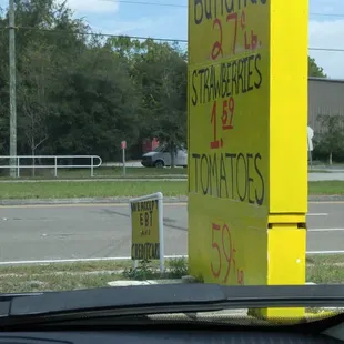 a sign on the side of the road