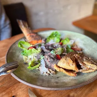 Fried 'whole' McFarland Springs Trout $70. Japanese mushrooms, pickled ginger and roasted black rice.