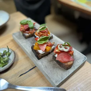 coal-roasted jimmy nardello toast  taggiasca olive butter &amp; pluots