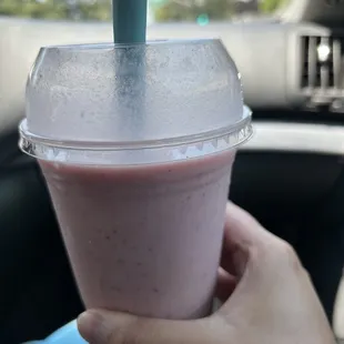 Strawberry cheesecake smoothie it comes with a small piece of cheesecake on top