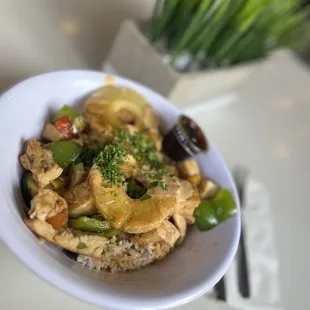 a bowl of chicken and vegetables