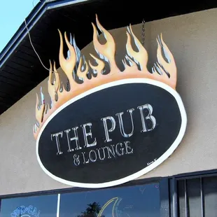 a sign for the pub and lounge