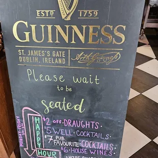 Sign at the hostess station with the specials