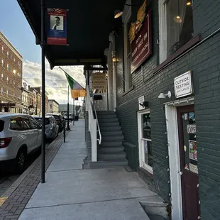 Take the steps down to the entrance to the cozy pub