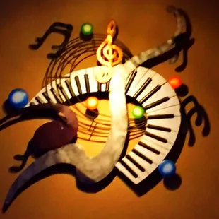 Music themed decor above the bar.