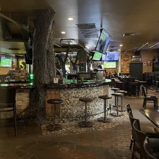 the bar and televisions in the background