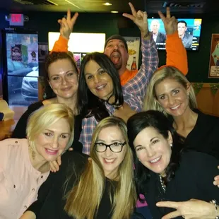 a group of women posing for a picture