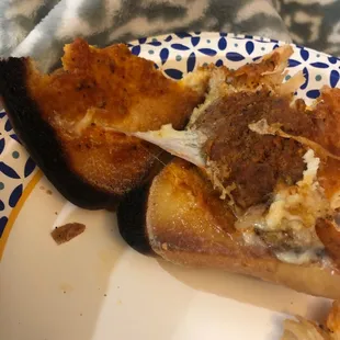 a slice of pizza on a plate