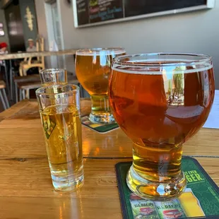 two glasses of beer on the table