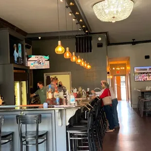 people sitting at the bar