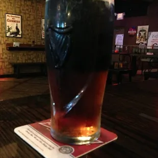 The "Yeungling Black &amp; Tan" in a really cool Guinness glass. One beer before the Theatre!