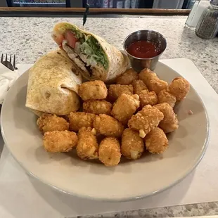 Chicken Fraser wrap with gator tots