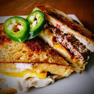 a grilled cheese sandwich with jalapenos