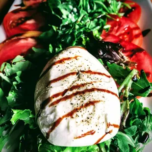 a salad with mozzarella and tomatoes