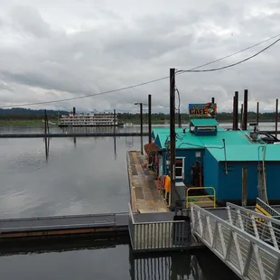 a view of a dock with boats