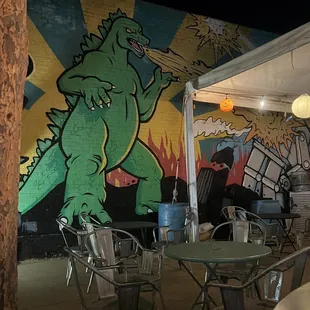 a dinosaur on the wall