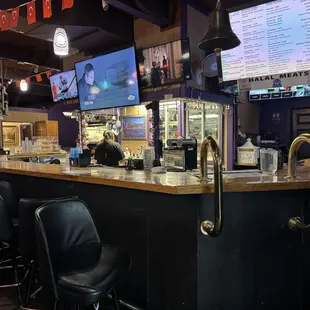 Bar seating and friendly staff. Dive bar, dated decor, but good the way it is!