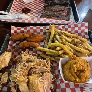 two trays of food on a table