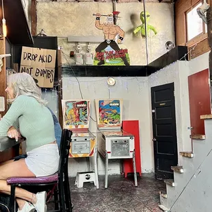 a woman sitting at a bar