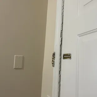 broken door frame-- very unsafe living condition