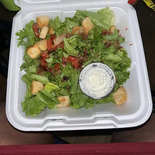 A thrown around the kitchen salad