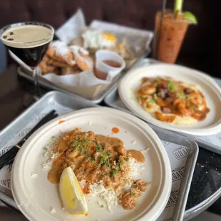 two plates of food on a tray