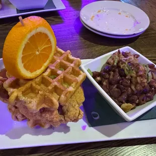 Chicken and waffle sandwich with red beans and rice