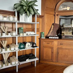 Soaps, candles, shirts, hat. An old register for display, pretty cool.