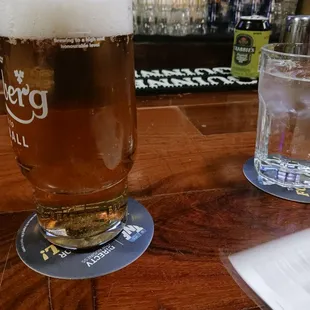 a pint of beer and a glass of water