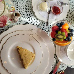 Scone and fresh fruit cup