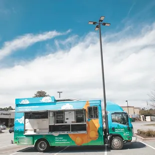 a food truck parked in a parking lot