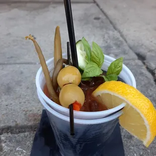 a drink in a plastic cup