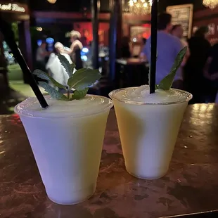 Frozen pineapple mojitos