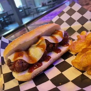 Meatball sub with provolone cheese and house BBQ