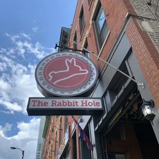 the sign for the rabbit hole