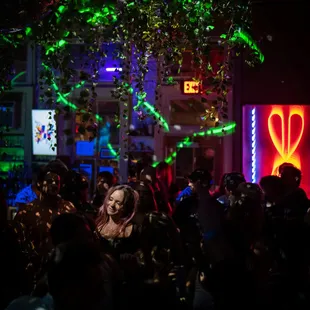 a crowd of people at a party