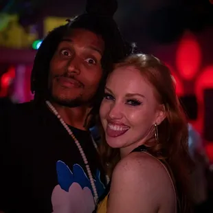 a man and a woman posing for a picture