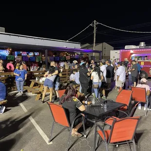 a large group of people eating outside