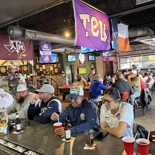 people sitting at the bar