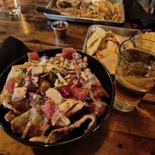 Tuna poke with wonton chips (tasty and surprisingly big portions!) Pint of beer for scale