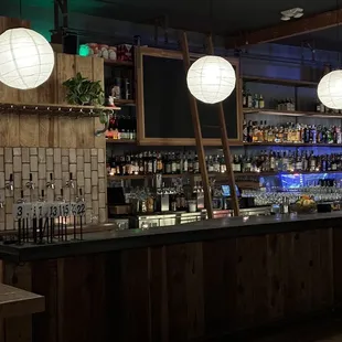 a bar with a lot of bottles
