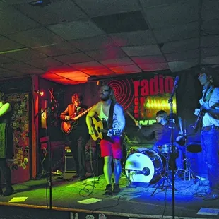 a band performing on stage