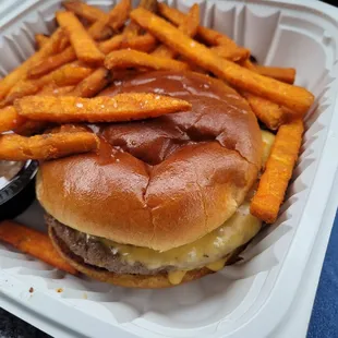 Kids cheeseburger and sweet potato fries to go!