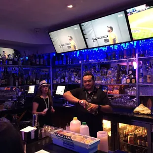 a man serving a drink