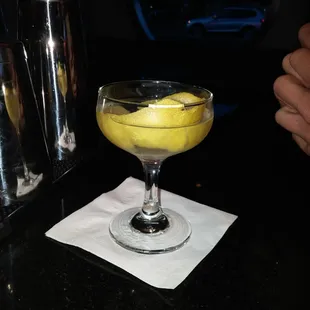 Gin martini in a champagne cocktail glass?? Also, very small....
