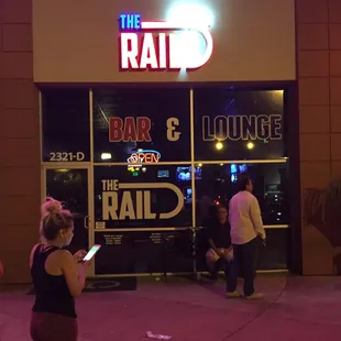 the entrance to a bar and lounge